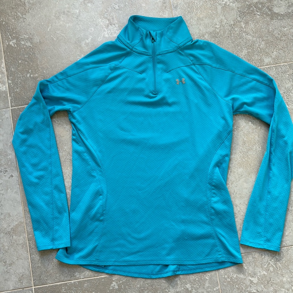 Under amour top size small with rear zip pocket